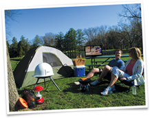 Photograph showing the Camper's Dream Pack being used outdoors including the Winegard Carryout